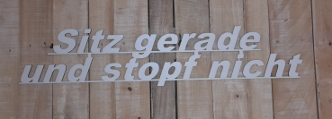 Schriftzug - Sitz gerade und stopf nicht