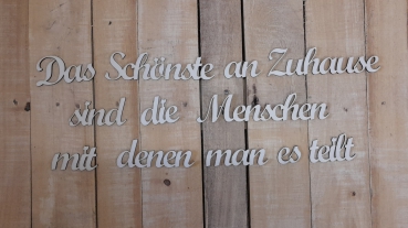 Schriftzug - Das schönste an Zuhause sind die Menschen mit denen man es teilt